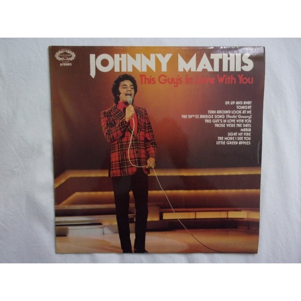 Johnny Mathis - This guys in love with you